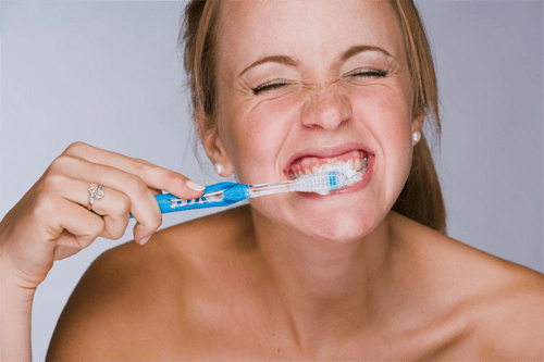 Oral Hygiene Facts - brushing hard